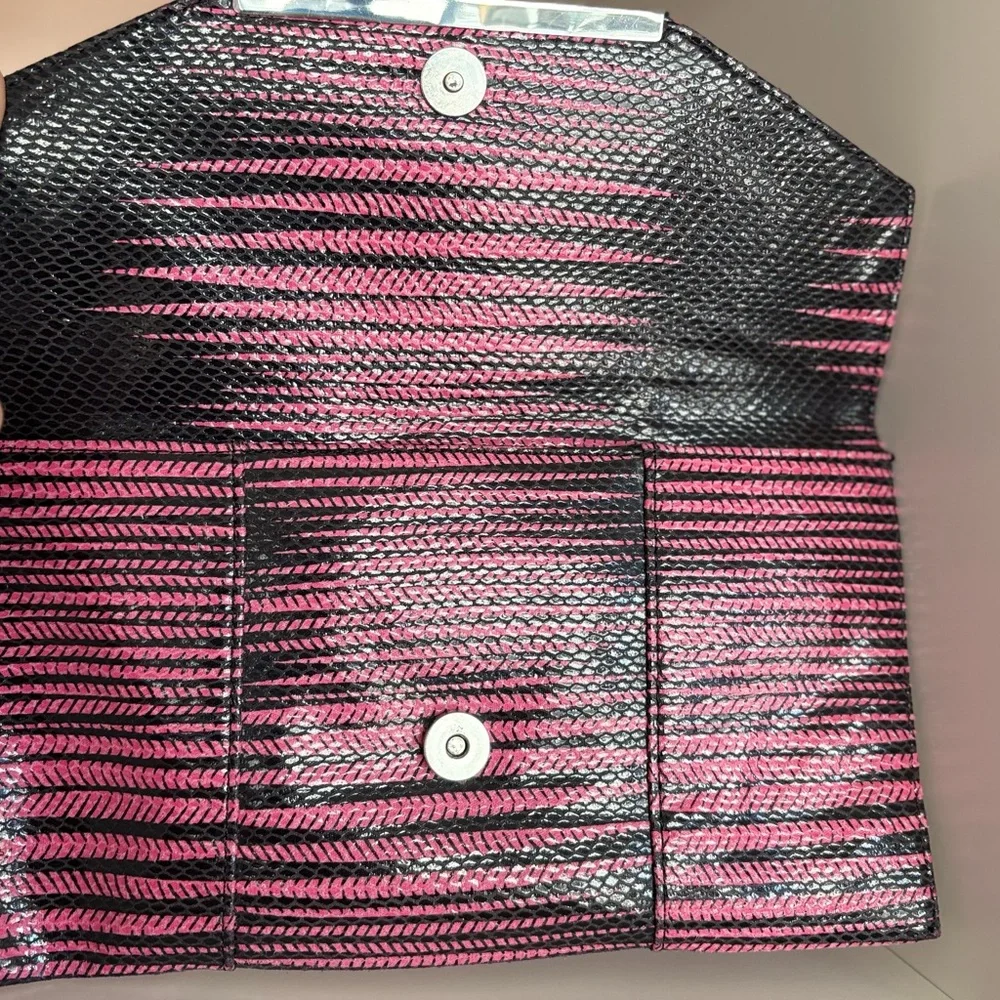 BCBGMaxazria Pink & Black Striped Clutch inside pockets with zipper. Very soft